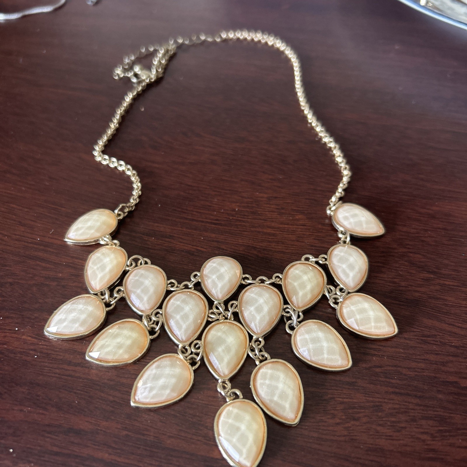 Cream champagne colored acrylic gem statement necklace in gold tone metal 20 In