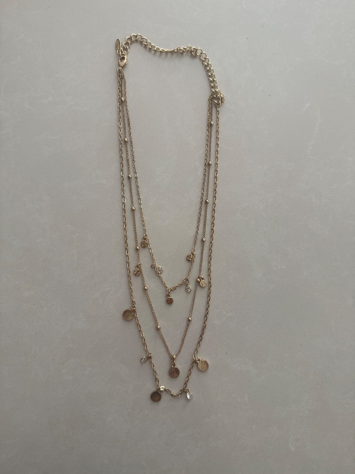 NEW Ettika Crystal charm Triple strand Pre-Layered Gold Necklace