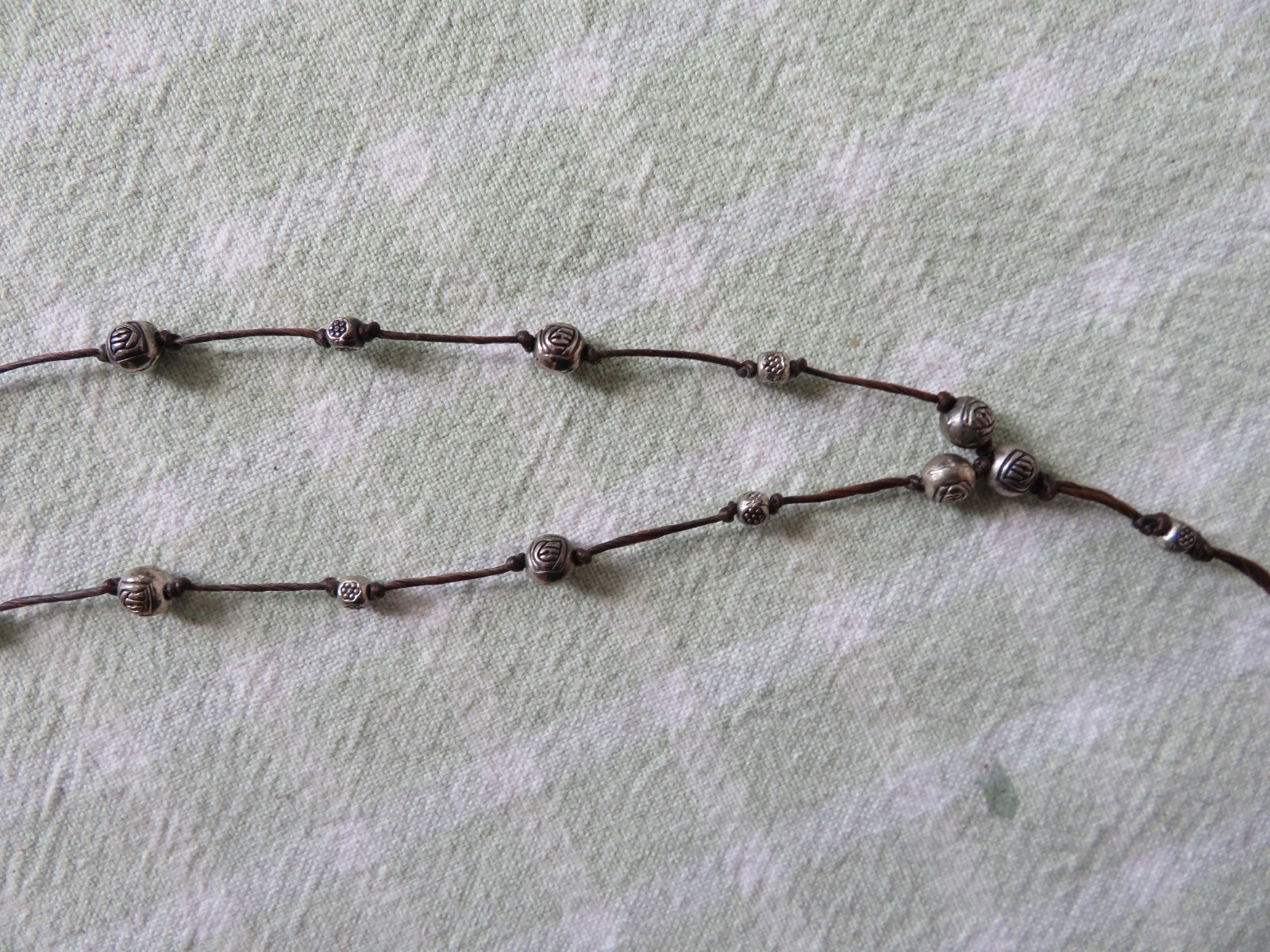 VINTAGE – APPROX. 20″ LONG BLACK & SILVER BEADED- HEART SHAPED NECKLACE
