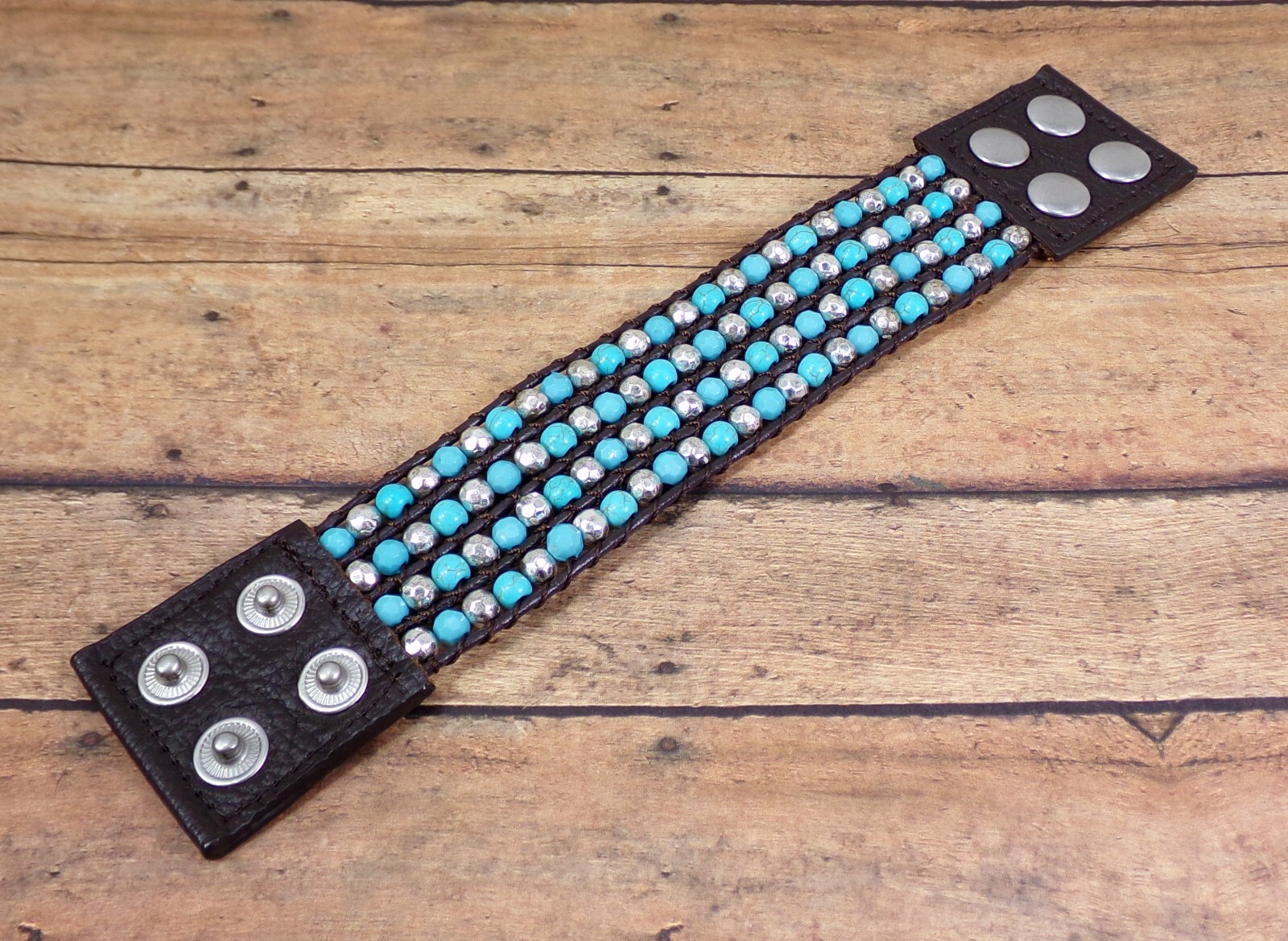 Wide turquoise and silver beaded leather bracelet , snap closure, brown leather