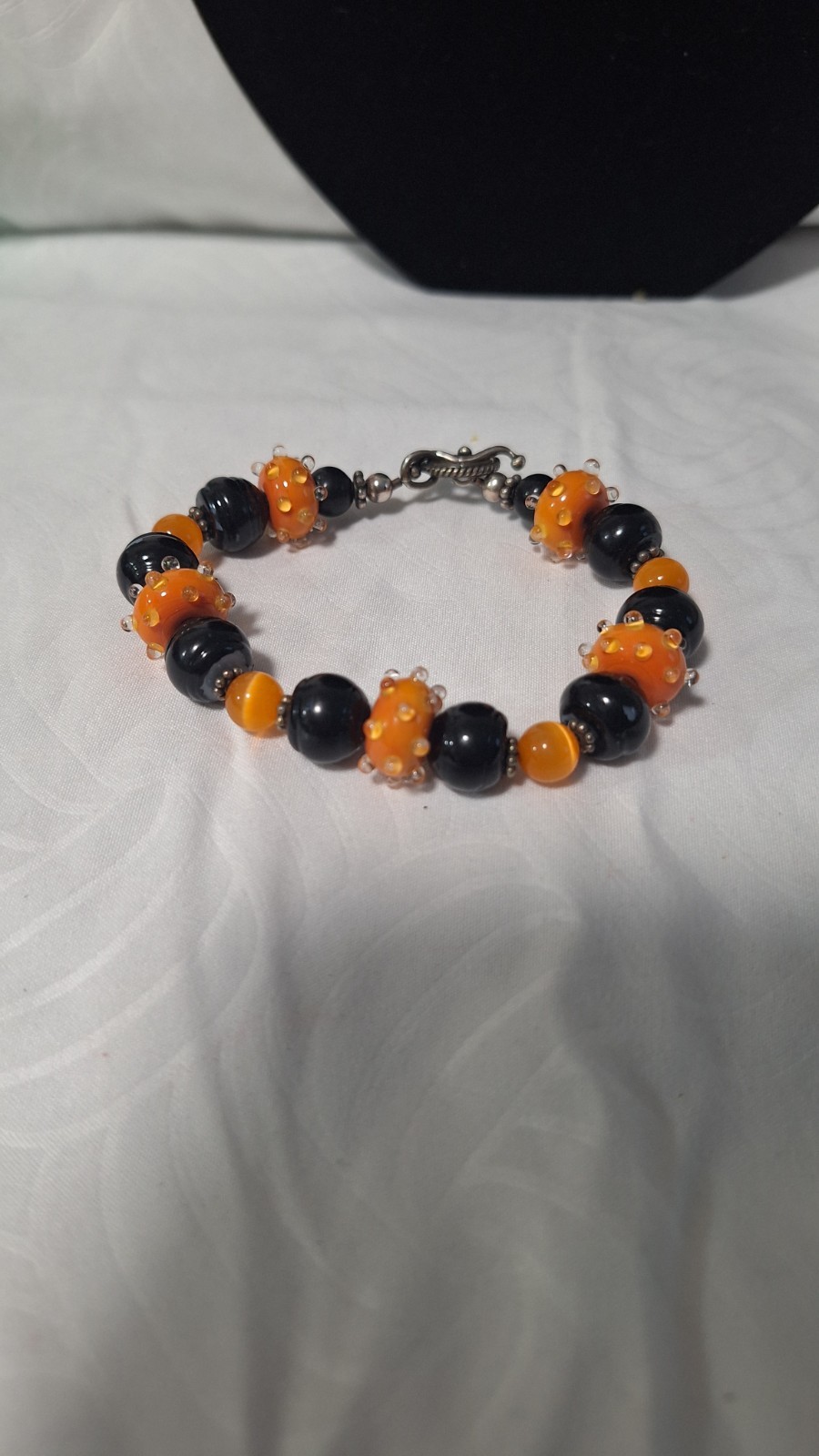 Black/Orange Glass Beaded Bracelet, Silver Tone Toggle Clasp, Dangle Charm