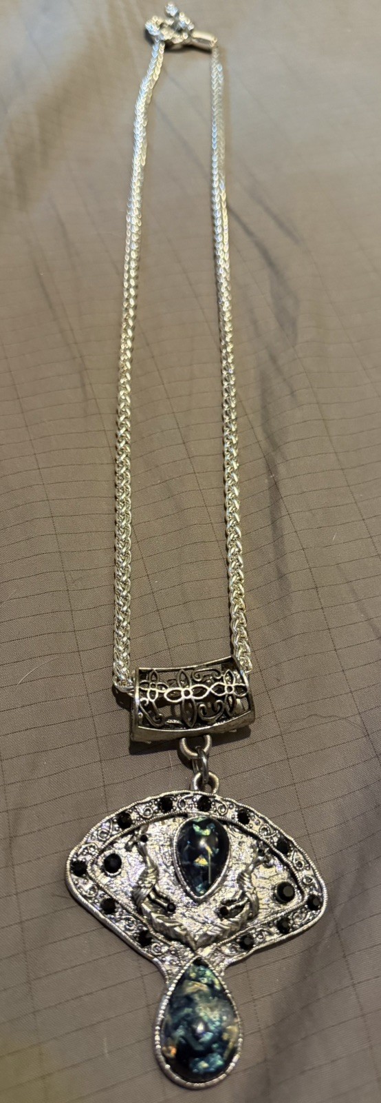 Vintage silvertone large 3″ wide charm with blue stones w/silver tone 27” chain