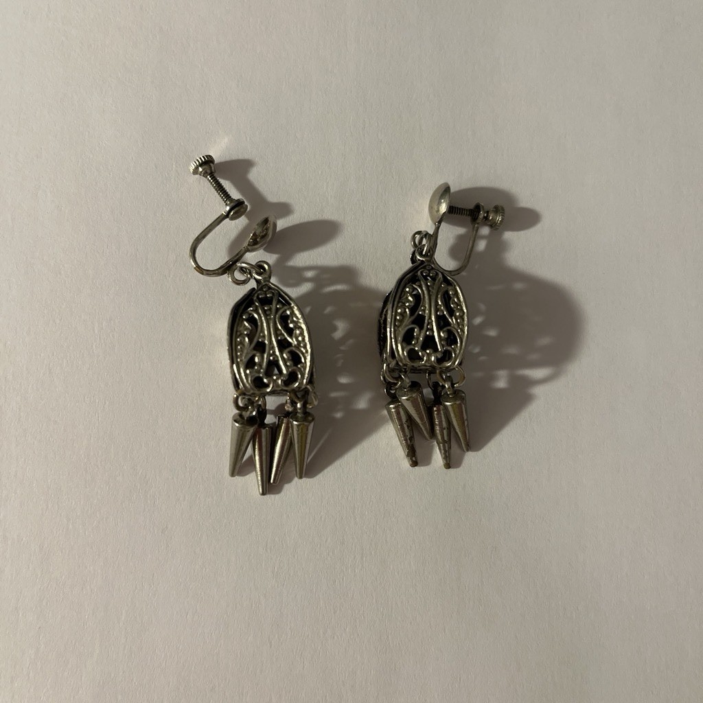 Silver Tone Earrings With Filigree Design And Dangling Spike