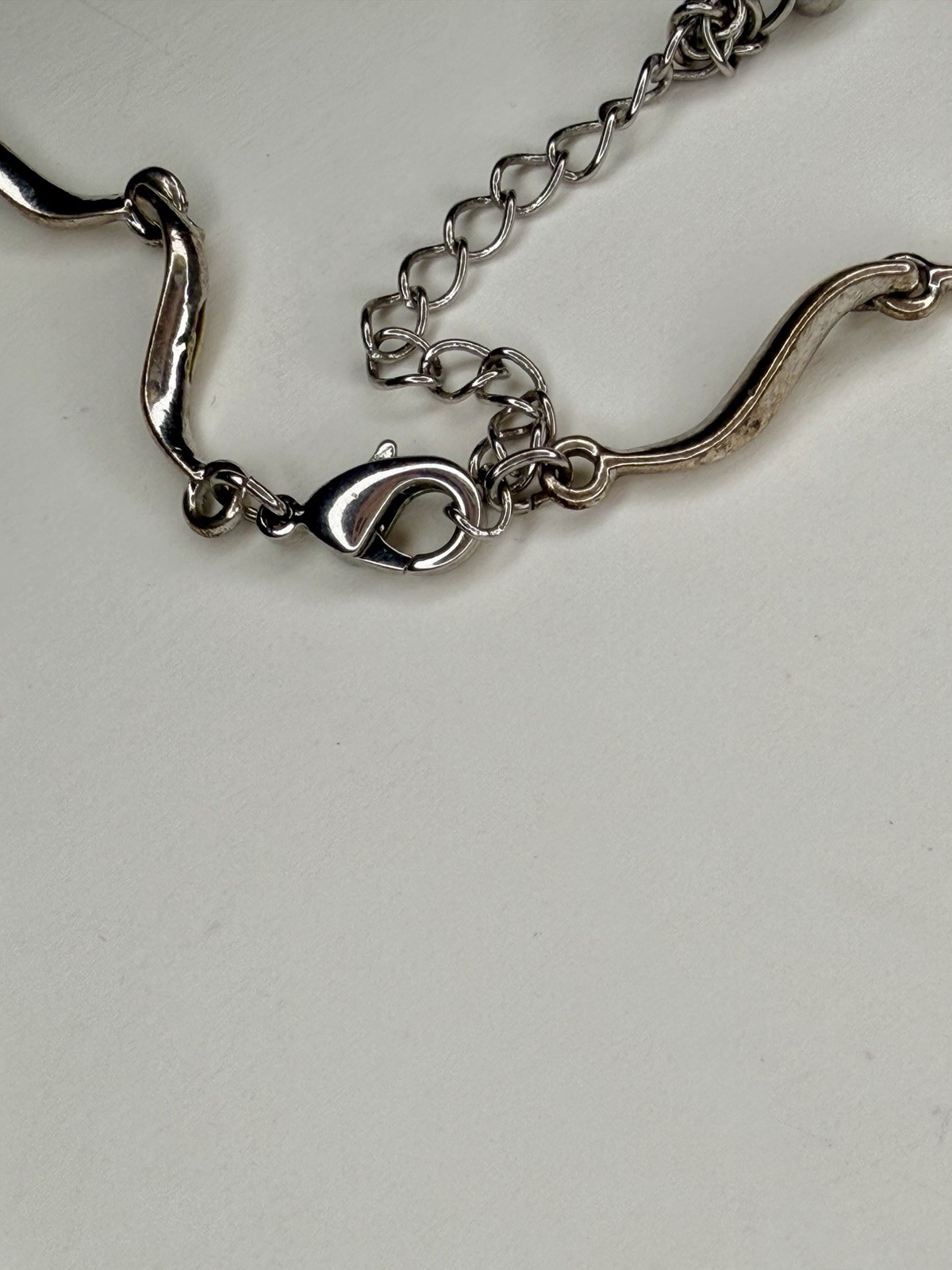 Vintage Avon Rhinestone Scroll Necklace Silver Tone Teardrop Crystal Pendant