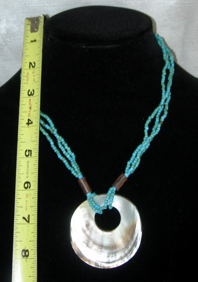 Santa Fe Style Turquoise Color Bead Three Strand Necklace with Shell Centerpiece