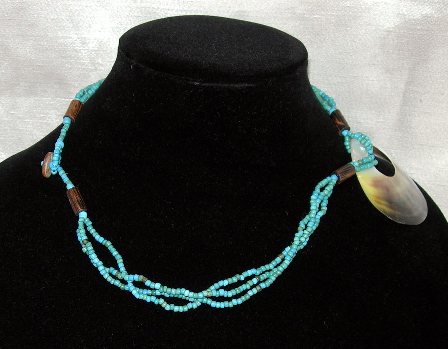 Santa Fe Style Turquoise Color Bead Three Strand Necklace with Shell Centerpiece