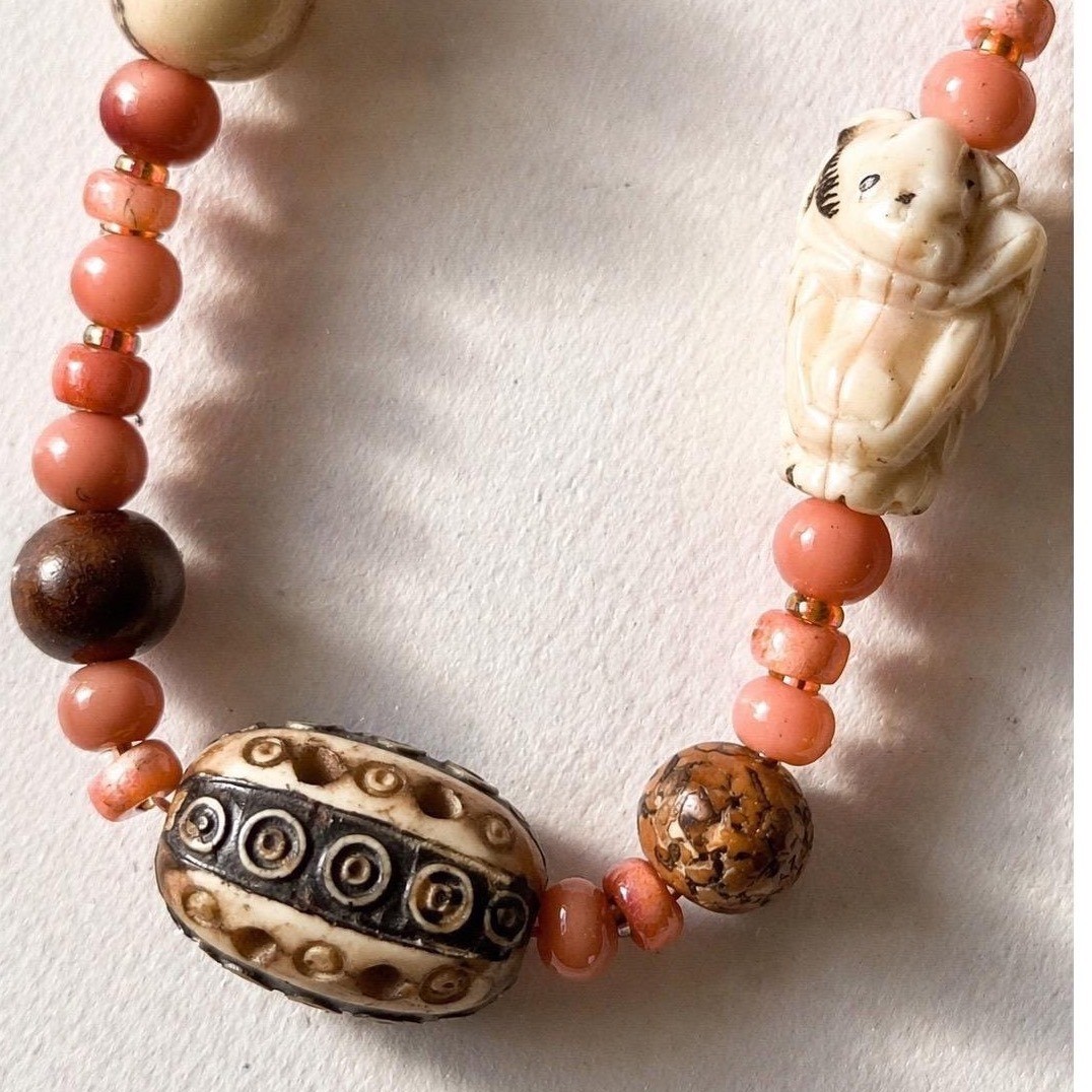 Bohemian Beaded Necklace Salmon Pink Hand Carved Figure Patterned Barrel Bead