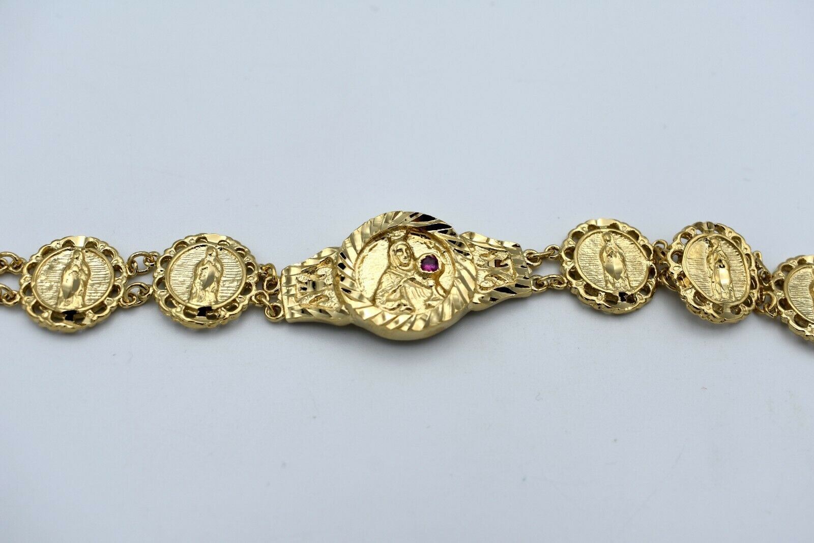 8 INCH 14KT HGE VIRGIN MARY BRACELET WITH RED STONE WEIGHS OVER 24 GRAMS B-216
