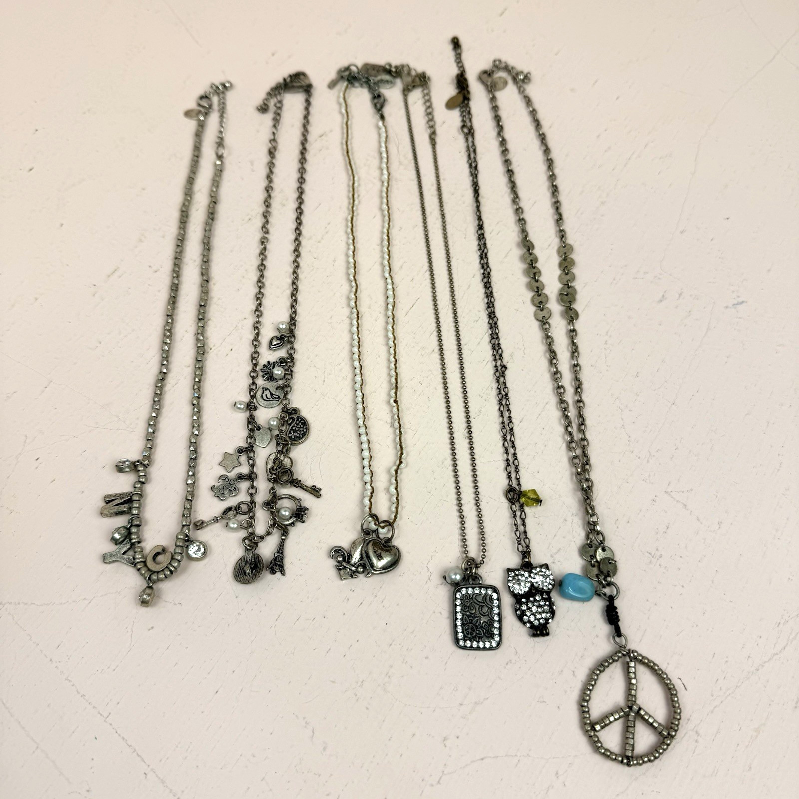 Lot of 6 Aeropostale Necklaces Y2K AERO Peace NYC Charms Owl FLeur de Lis etc