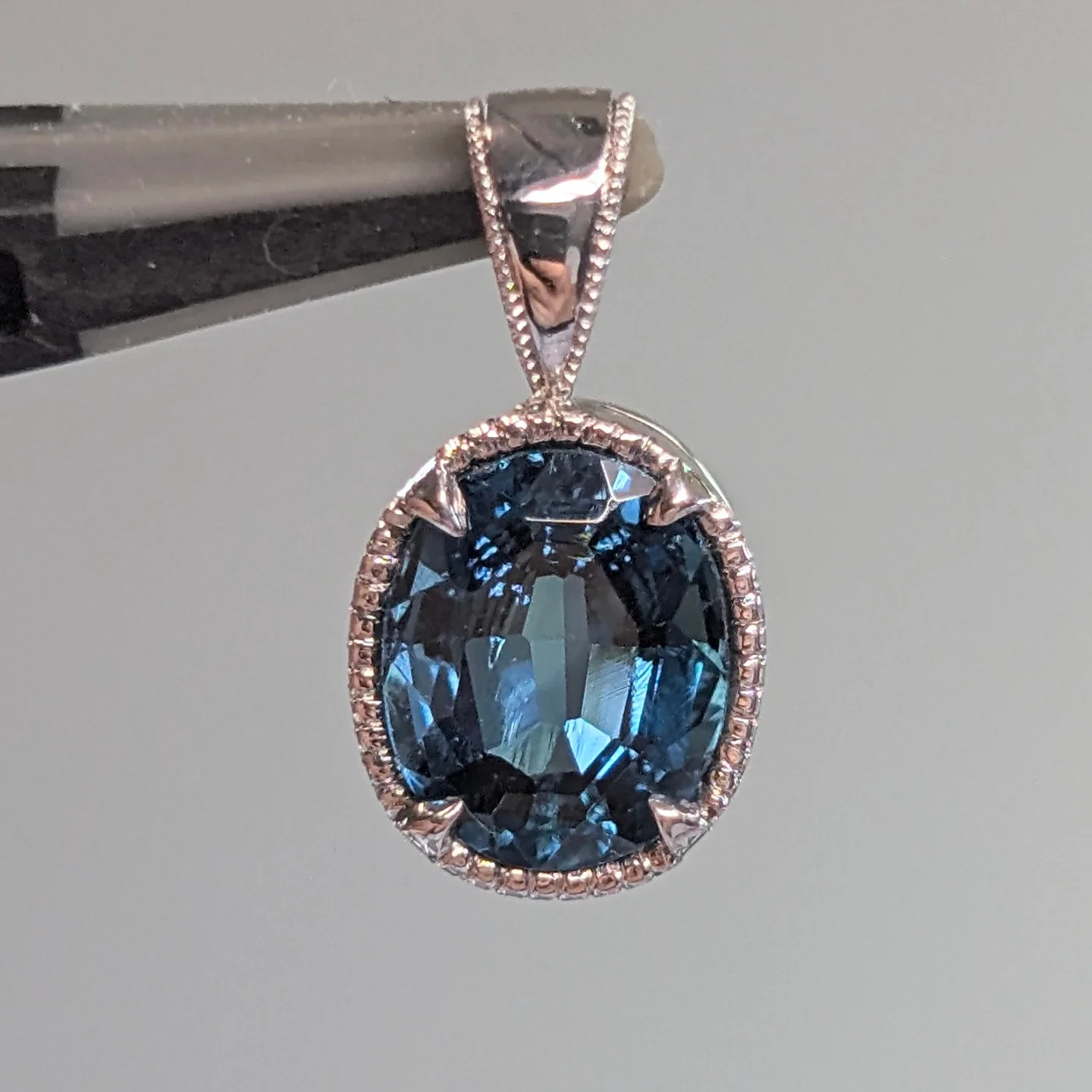 Elegant CZ Diamond Fancy Blue Oval Cut Solitaire Bezel Set Pendant For Her