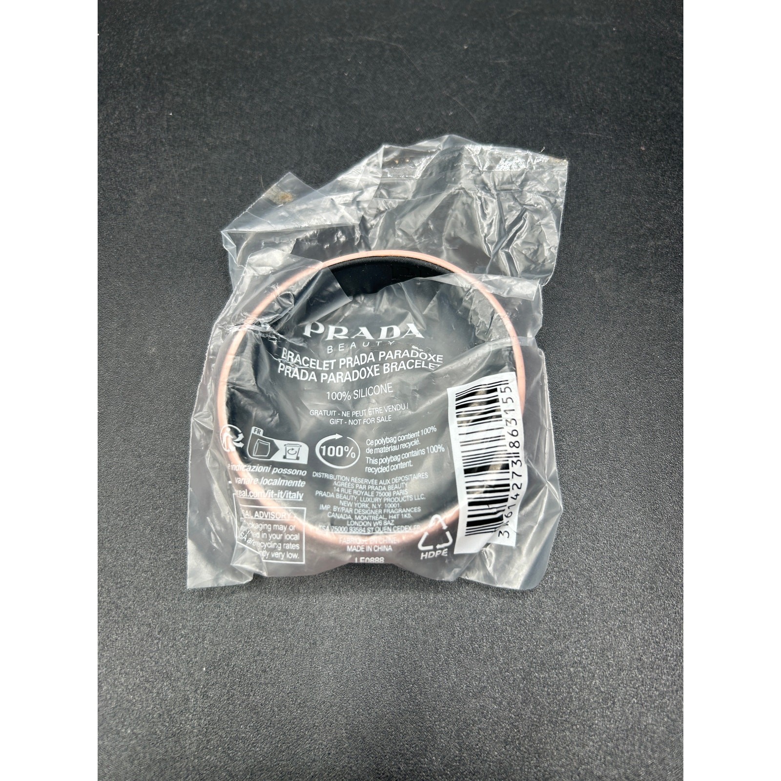 Reversible Prada Beauty pink plastic bracelet