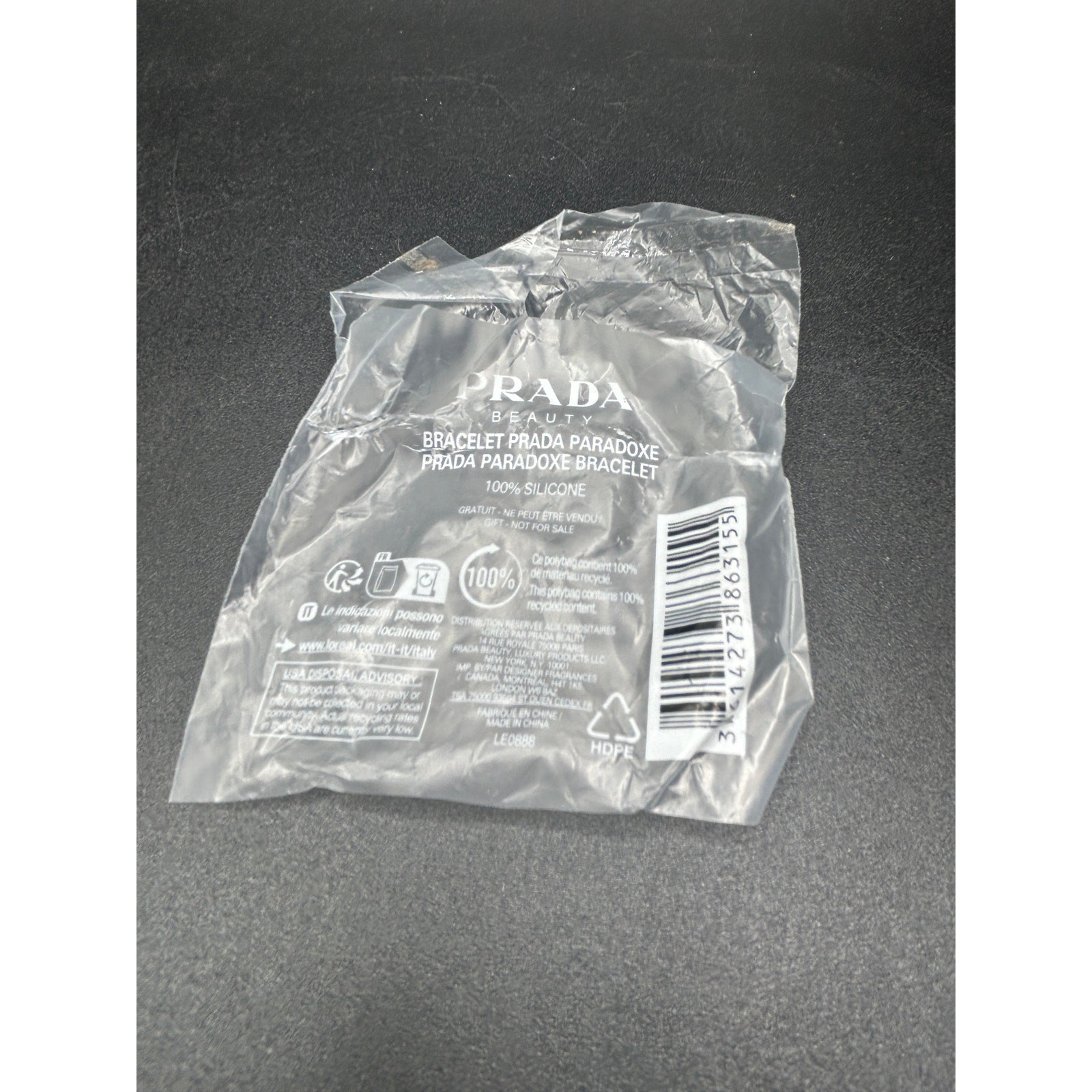 Reversible Prada Beauty pink plastic bracelet