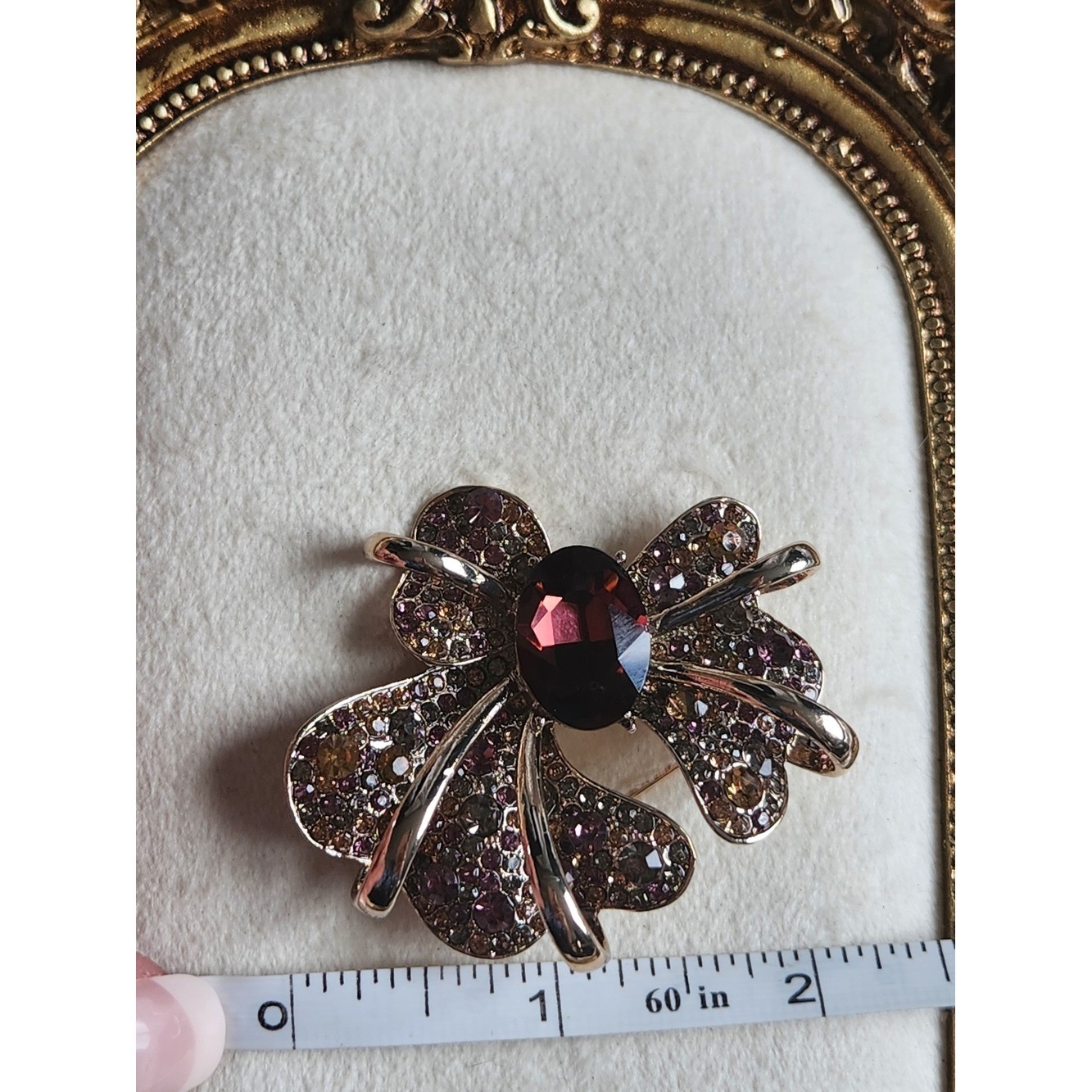 Gold-Tone Bow Brooch with Garnet-Center and Pink/Champagne Crystals