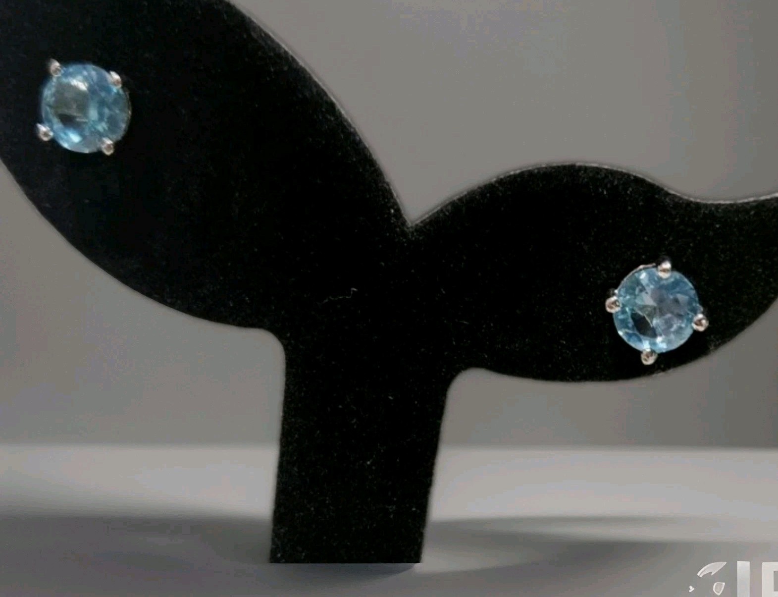 Beautiful Silver and Natural Sky Blue Topaz Stud Earrings