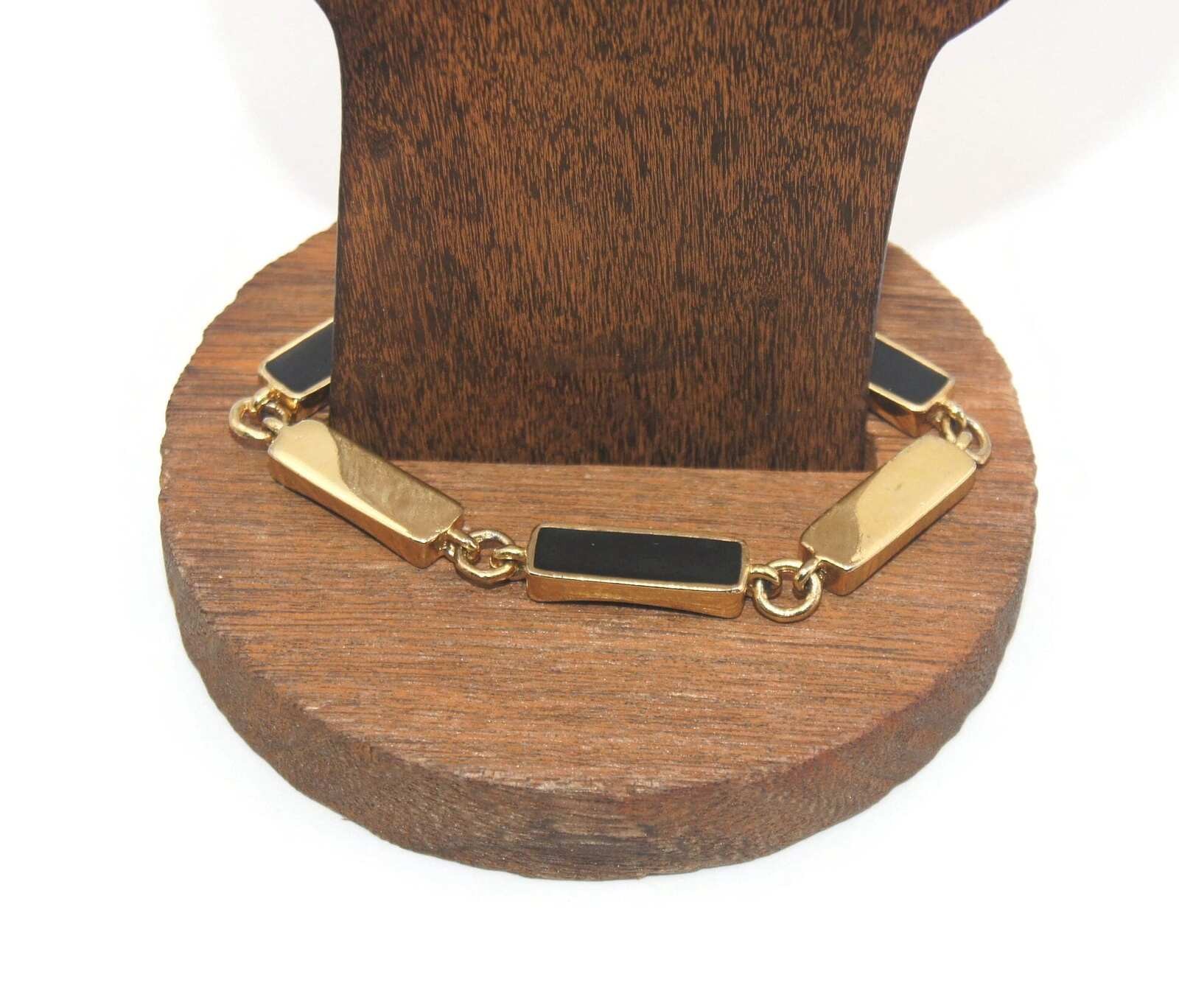 Vintage Nine West Gold Tone and Black Enamel 7″ Bracelet with Slide Lock Clasp.