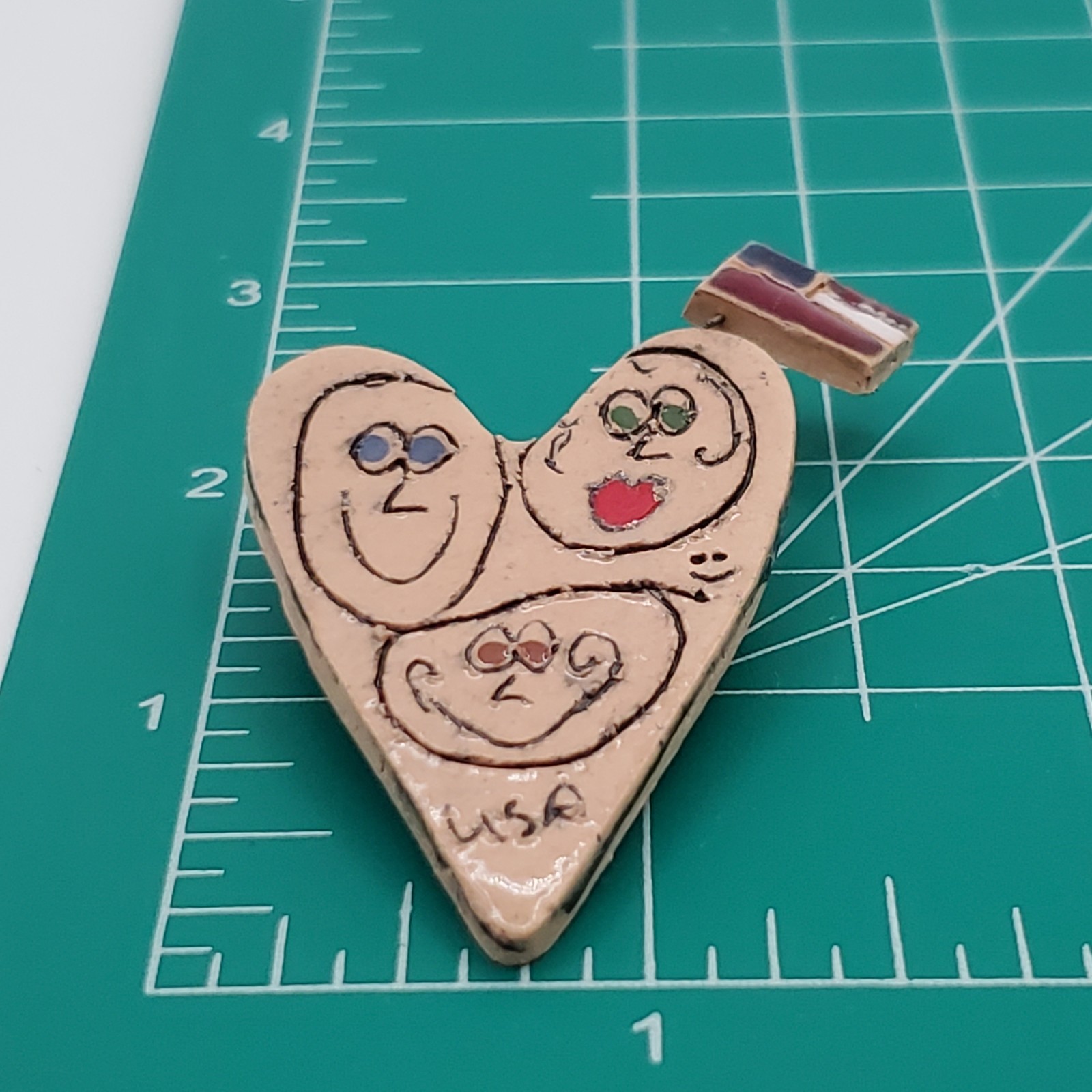 VTG Heart Brooch 2.25in Tan Porcelain Hand Crafted Floating Flag Faces USA Pin