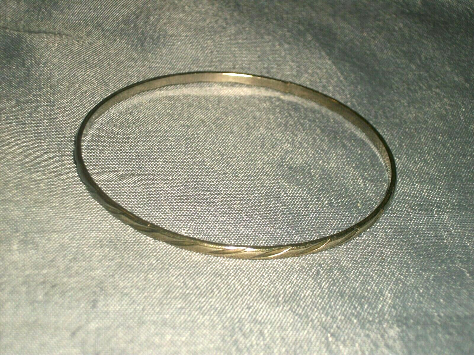 Women’s Bangle Bracelet 2 5/8′ in Diameter Silver Tone Metal with Design