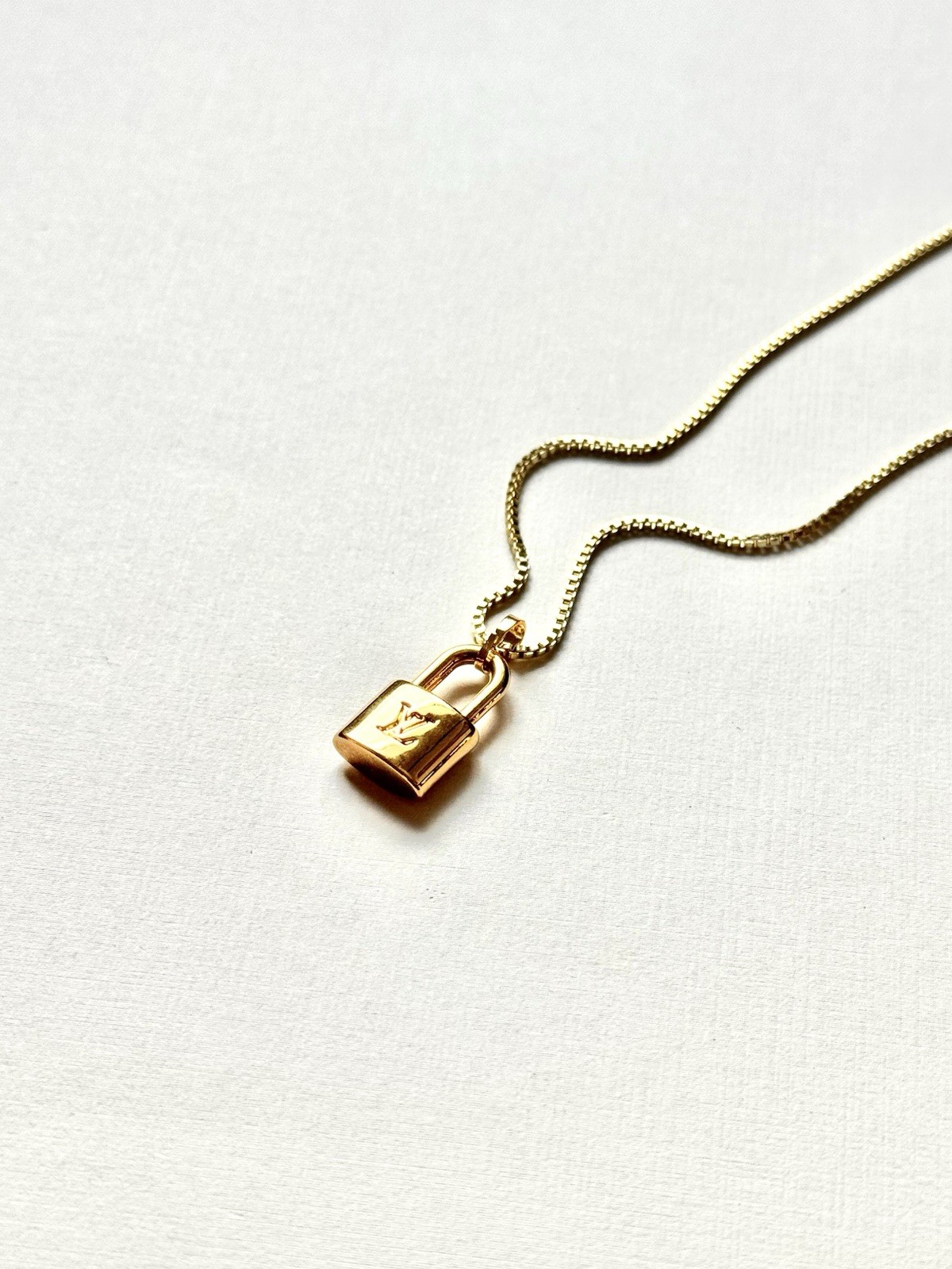 Louis Vuitton Gold Plated LV Lock Pendant on Chain/Necklace