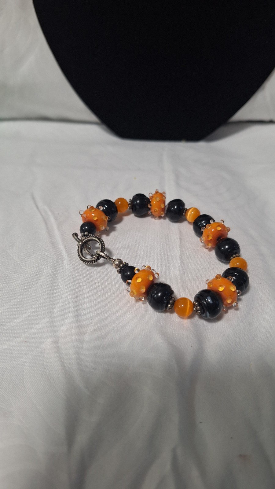 Black/Orange Glass Beaded Bracelet, Silver Tone Toggle Clasp, Dangle Charm