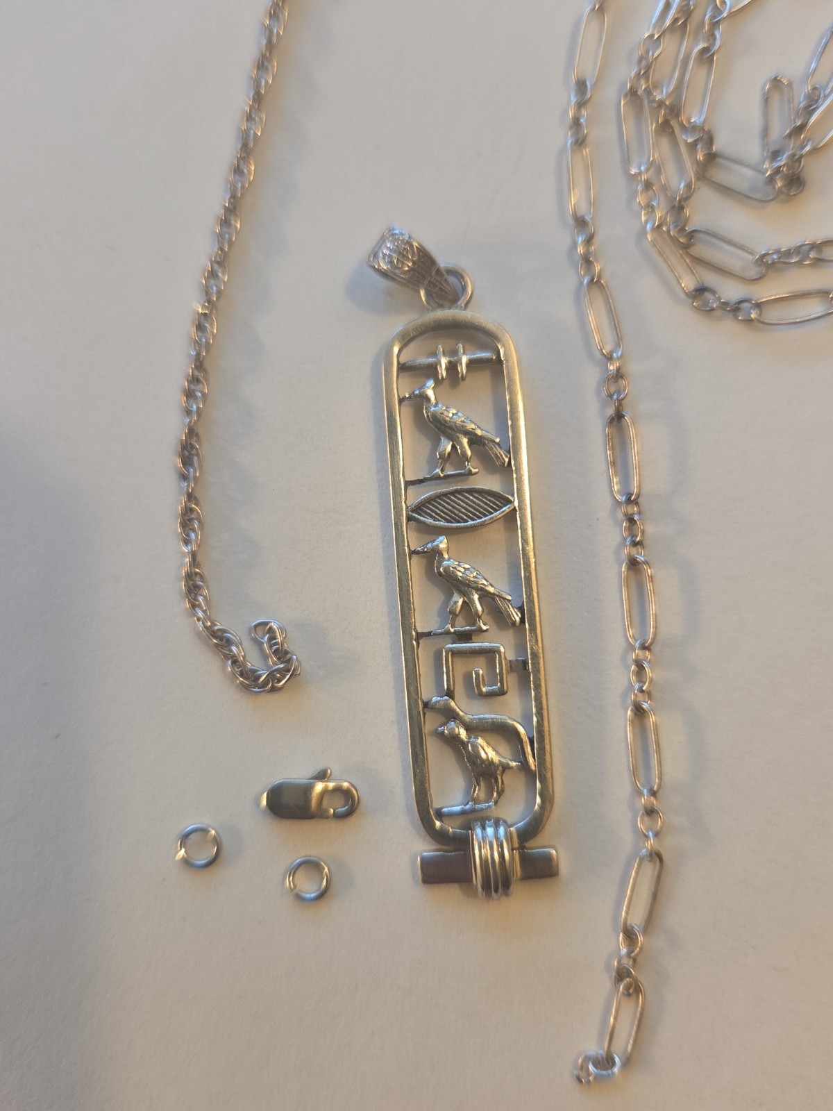 jewelry set 2 Jump Rings, 1 Clasp, 2 Necklaces and a charm