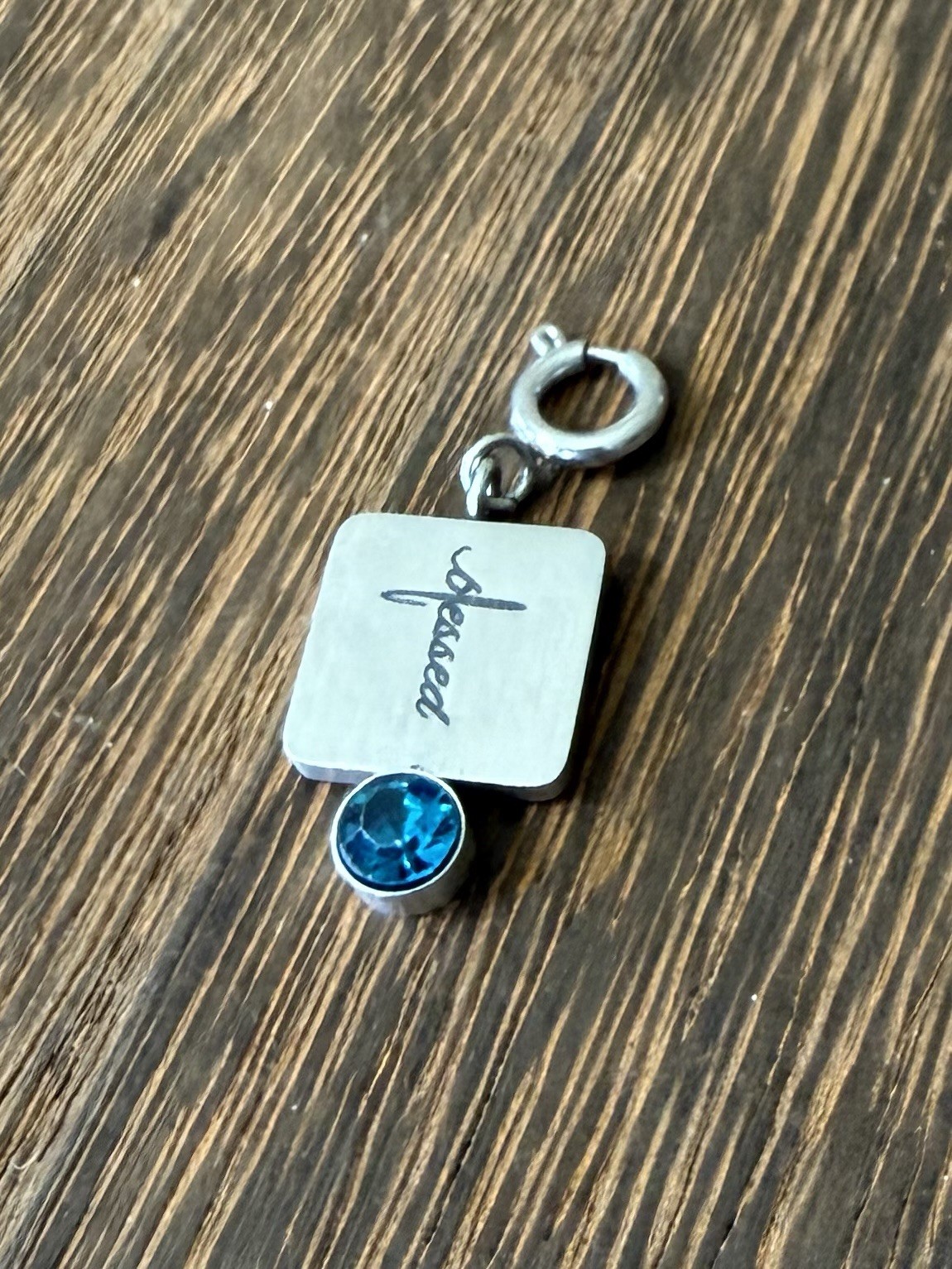 Silver ‘Blessed’ Cross Symbol Charm With Blue Rhinestone