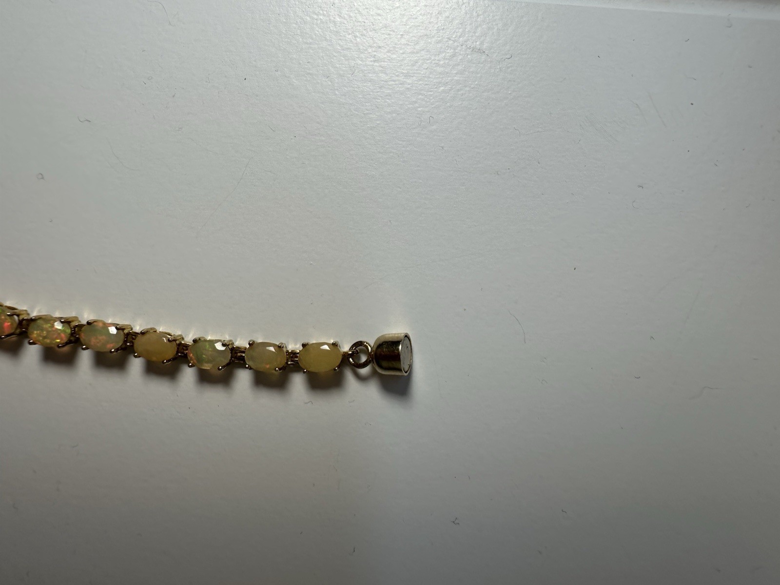 Gold-Tone Tennis Bracelet Yellow Opalite Oval Stone 6.75in magnetic clasp
