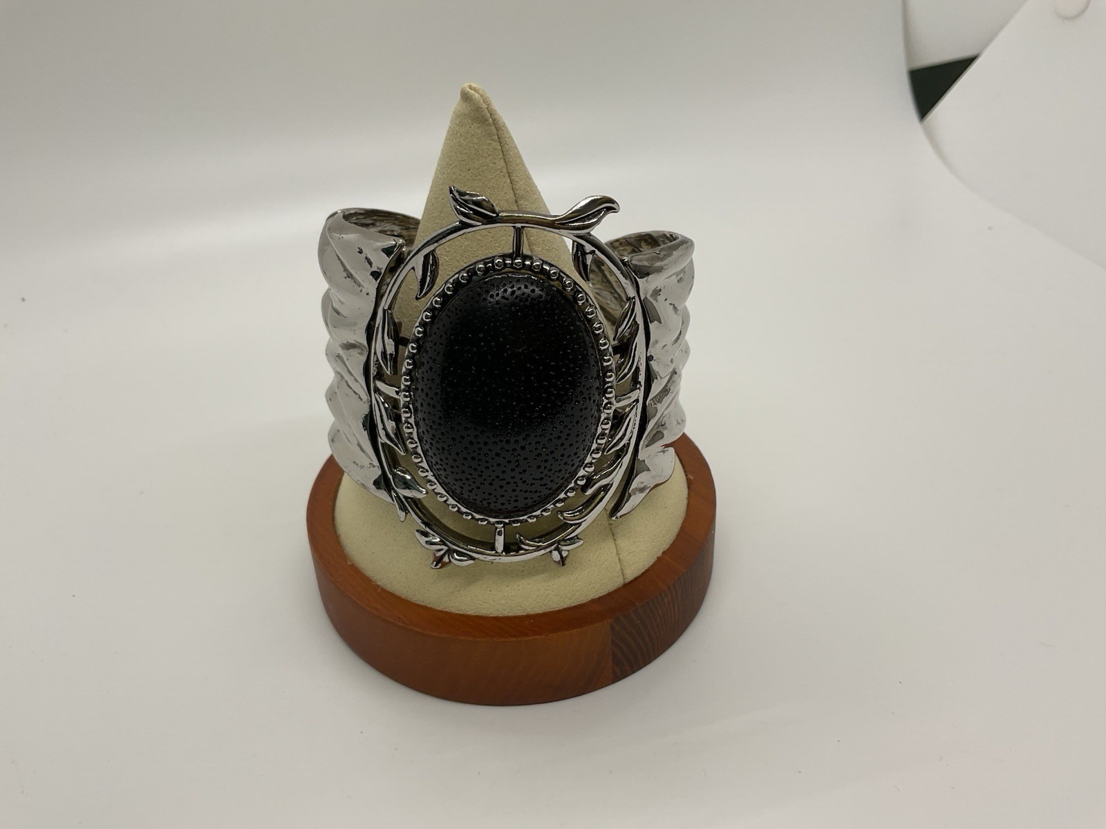 Black Oval Center And Ornate Silver Cuff
