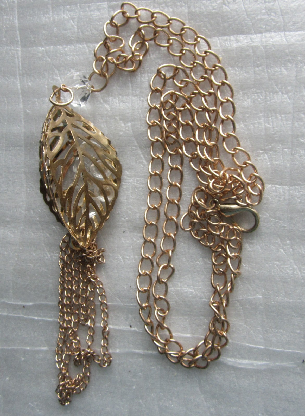 Filigree Gold Tone Leaf Pendant with Inside Clear Settings 30 in. Necklace