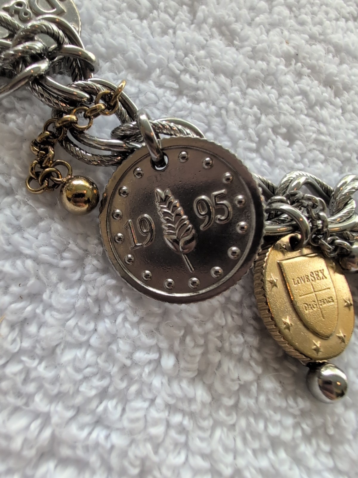 Dolce gabbana bracelet With 15 charms great condition, 8.5″ long Heavy Piece