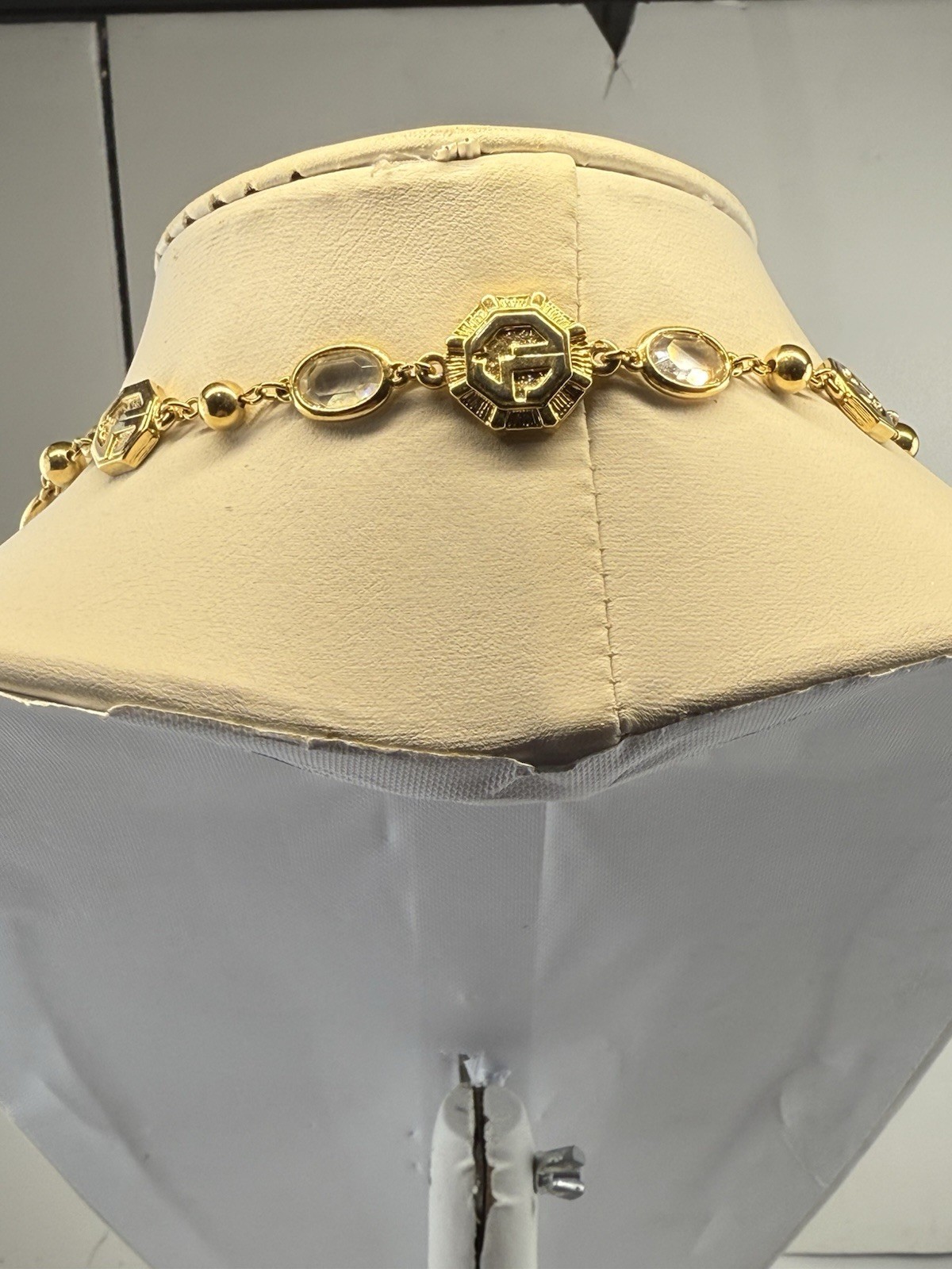 St. John Vintage 38″ Long Gold Tone Logo Necklace Clear Bezel Stations