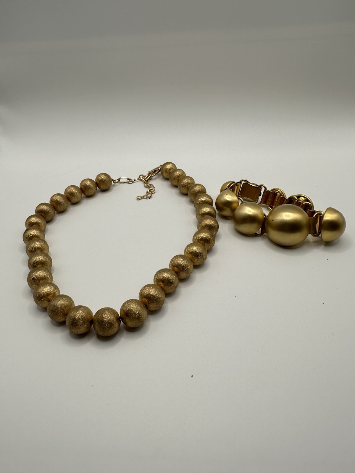 Gold Tone Plastic Beaded Necklace And Metal Bracelet
