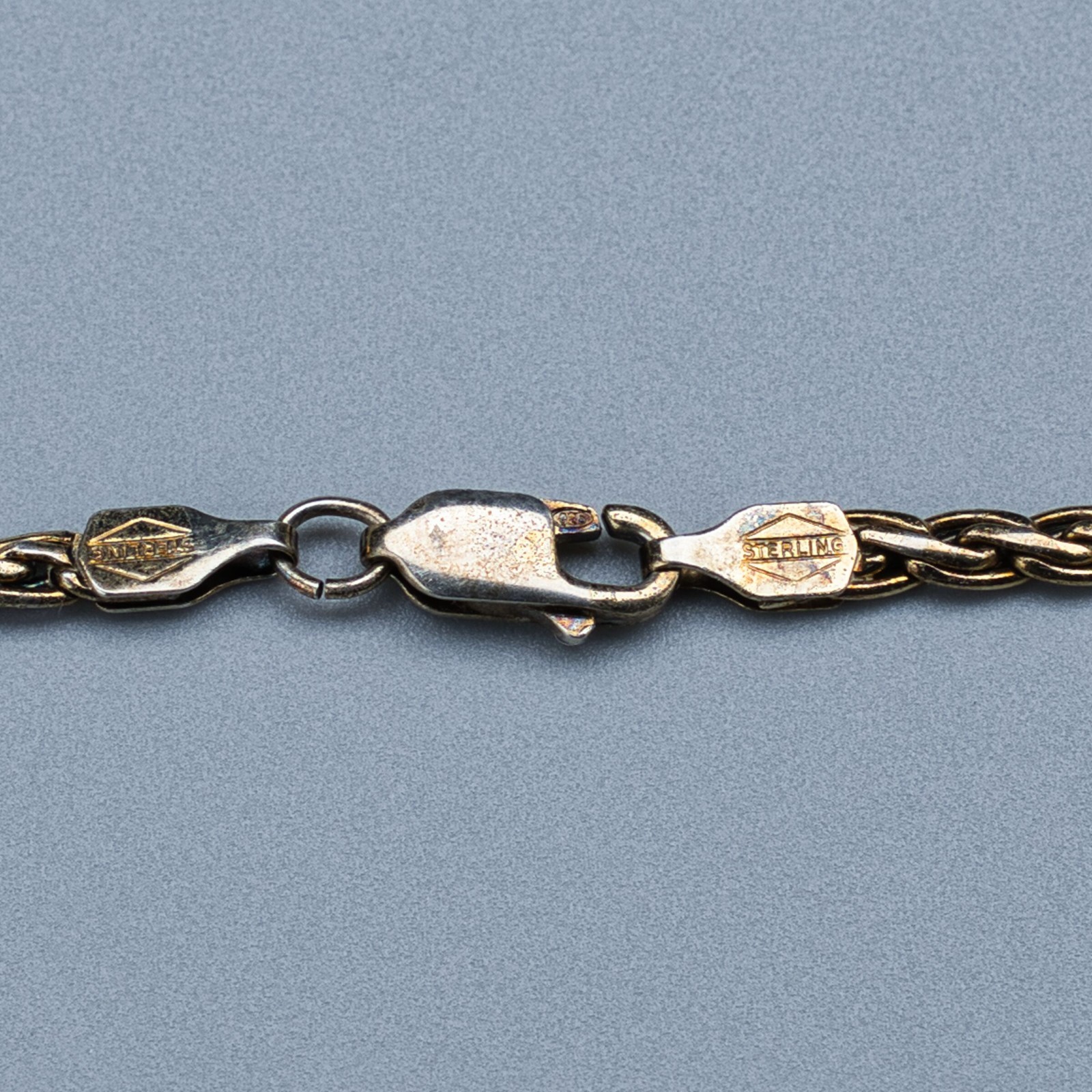 Vintage Gold-Tone Sterling Silver Braided Necklace with Baguette-Cut Clear Stone