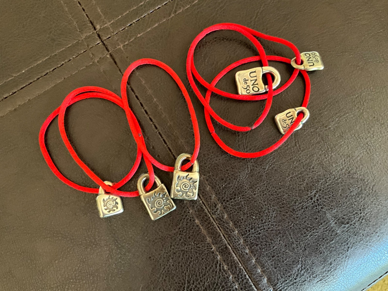 Uno De 50 Silver Tone Padlock Charm purchased in Spain