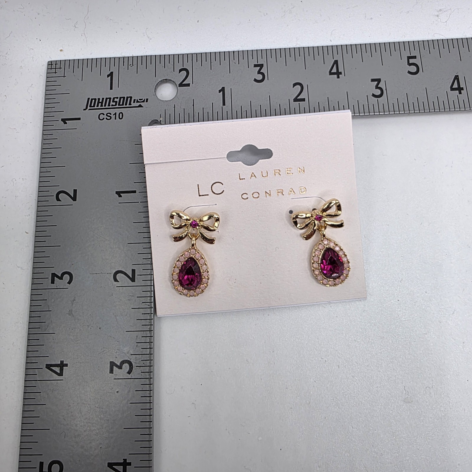 LC Lauren Conrad Earrings Gold Tone Crystal Purple Rhinestones Bow Drop NWT