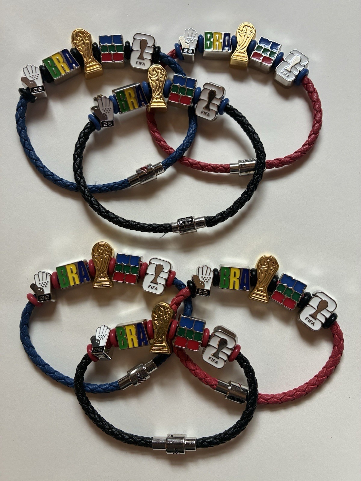 BofA FIFA Brazil red, black, and blue large 9 1/2”and small 7 1/2”. 15 in stock