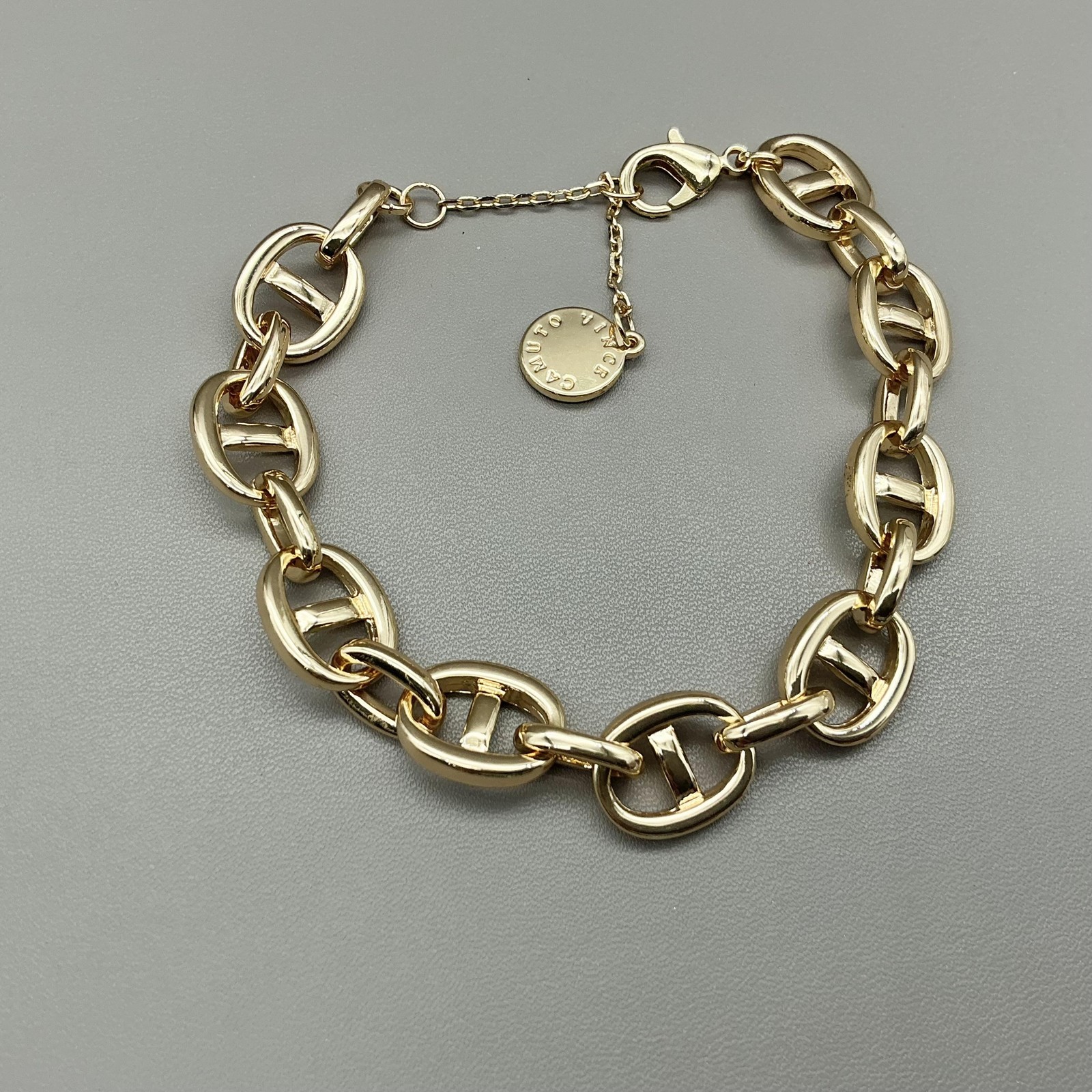 Vince Camuto Bracelet Gold Tone Chain Link Womens Logo Charm Lobster Clasp 8″