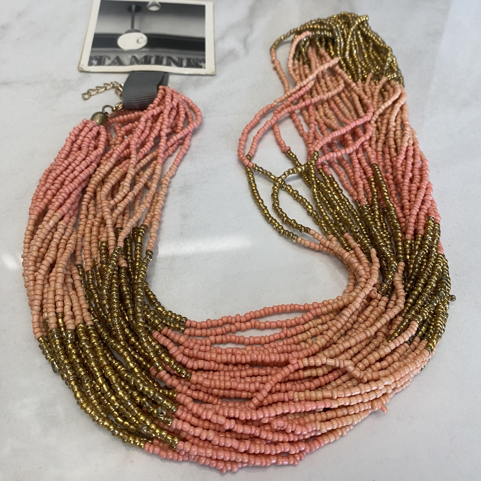New Seed Bead Necklace by Anthropologie salmon pink gold NWT $38. Multi Strand