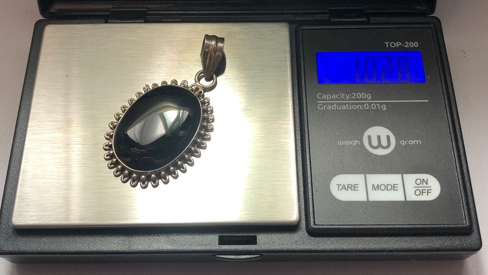 Black Onxy Oval Cabochon Pendant Bezel Set In Sterling Silver