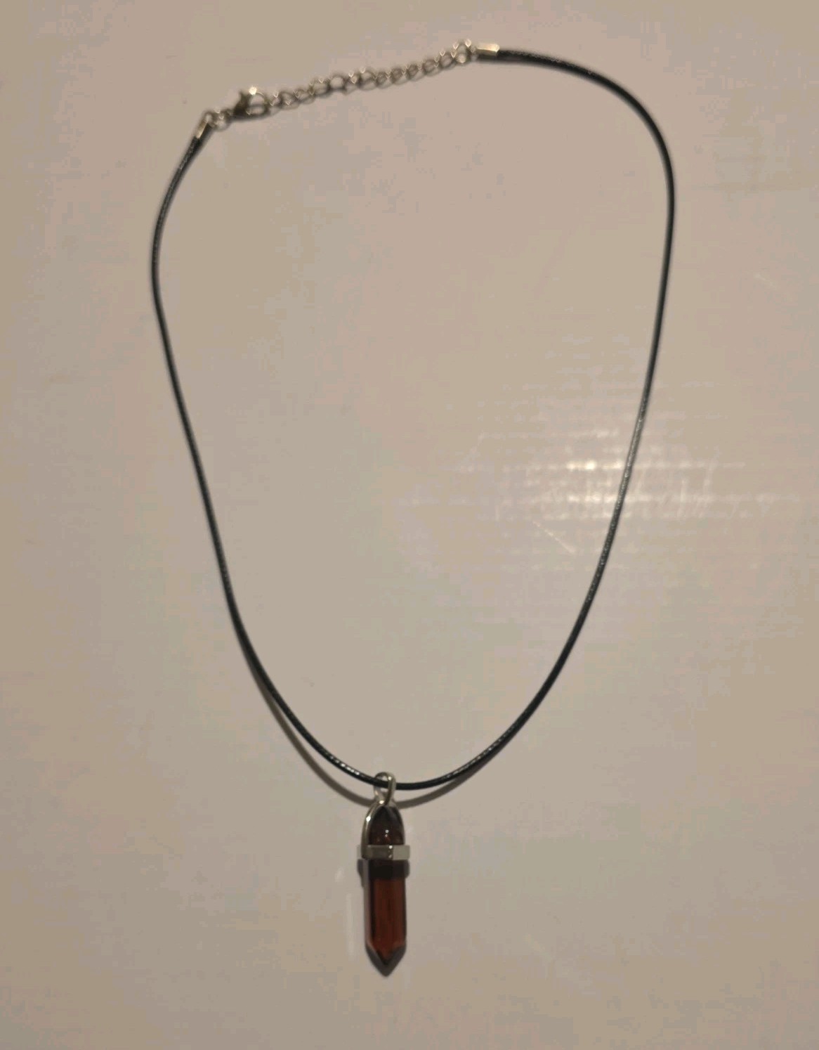 Clear Brown Hexagonal Pendant On Black Cord. Necklace.