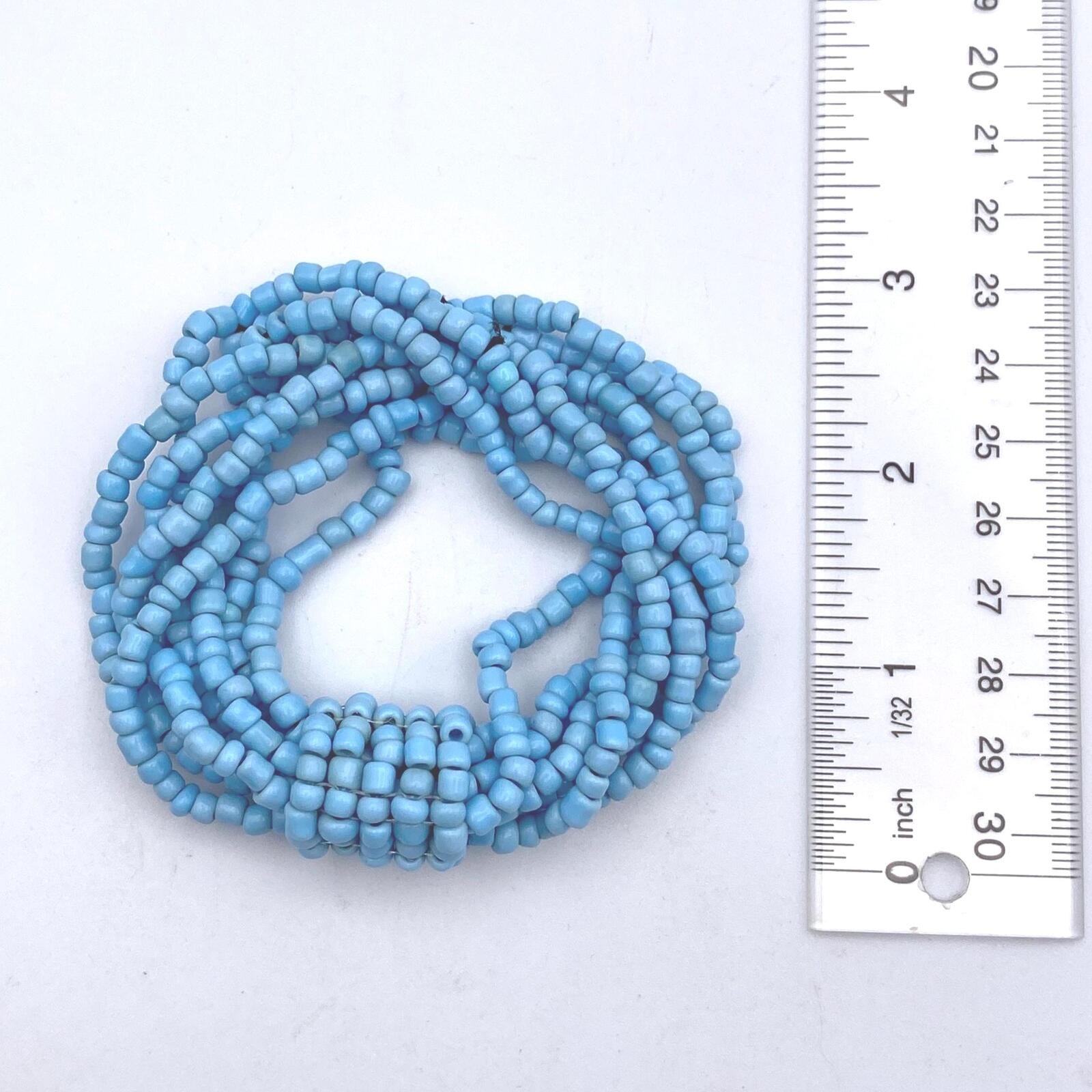 Vintage Blue Glass and Black Elastic Beaded 8 Strand 7 Inch Elastic Bracelet.