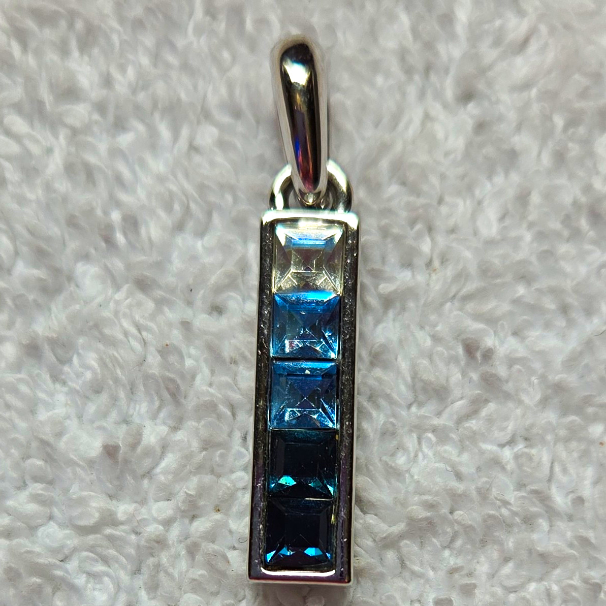 lia sophia Silver Tone Blue Simulated Crystal Channel-Set Bar Pendant, Signed