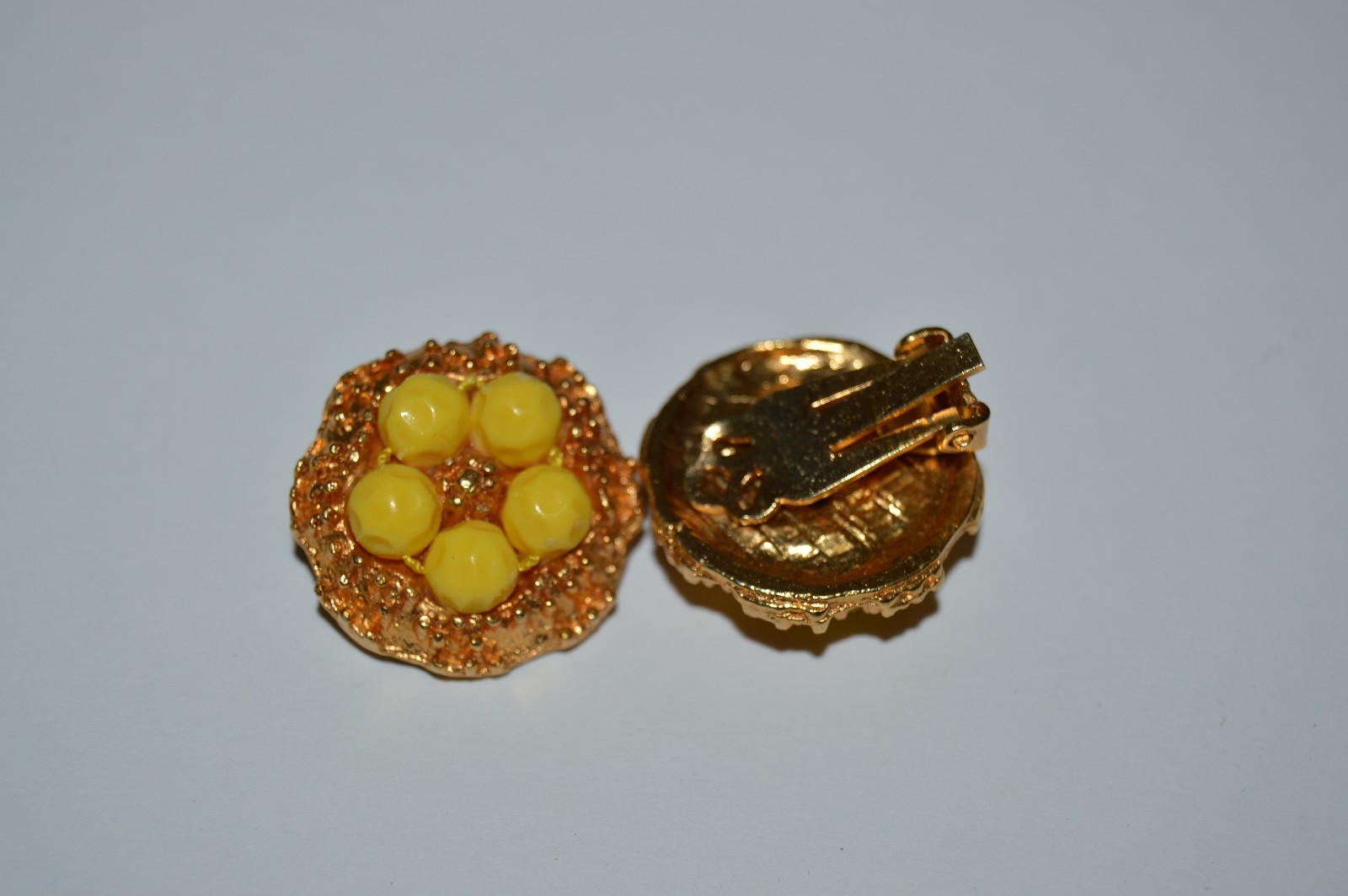 Vintage 1960s Yellow Plastic and Metal Ornate Round Clip On Earrings Rare