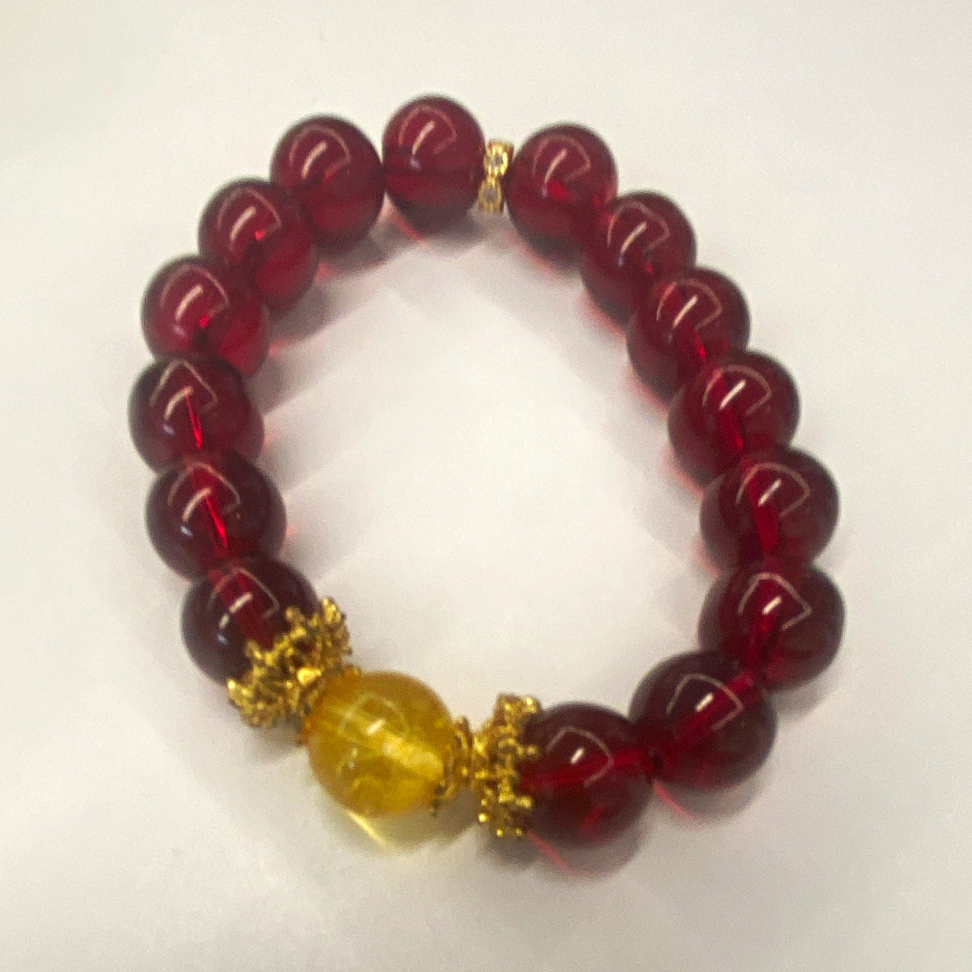 Red Beaded Stretch Bracelet w/ Yellow Center Bead, Gold Tone Spacers