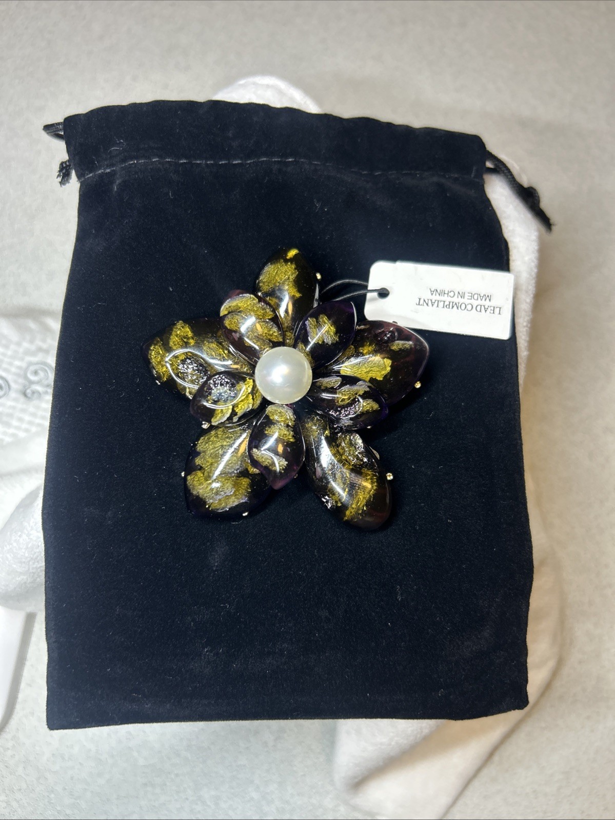 NATASHA RESIN FLOWER BROOCH WITH MULTICOLOURED RHINESTONES IN YELLOW/ BLACK