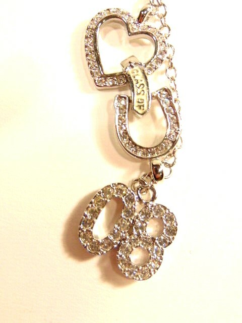 pre-owned silver colored necklace with white crystals “Class of 08”
