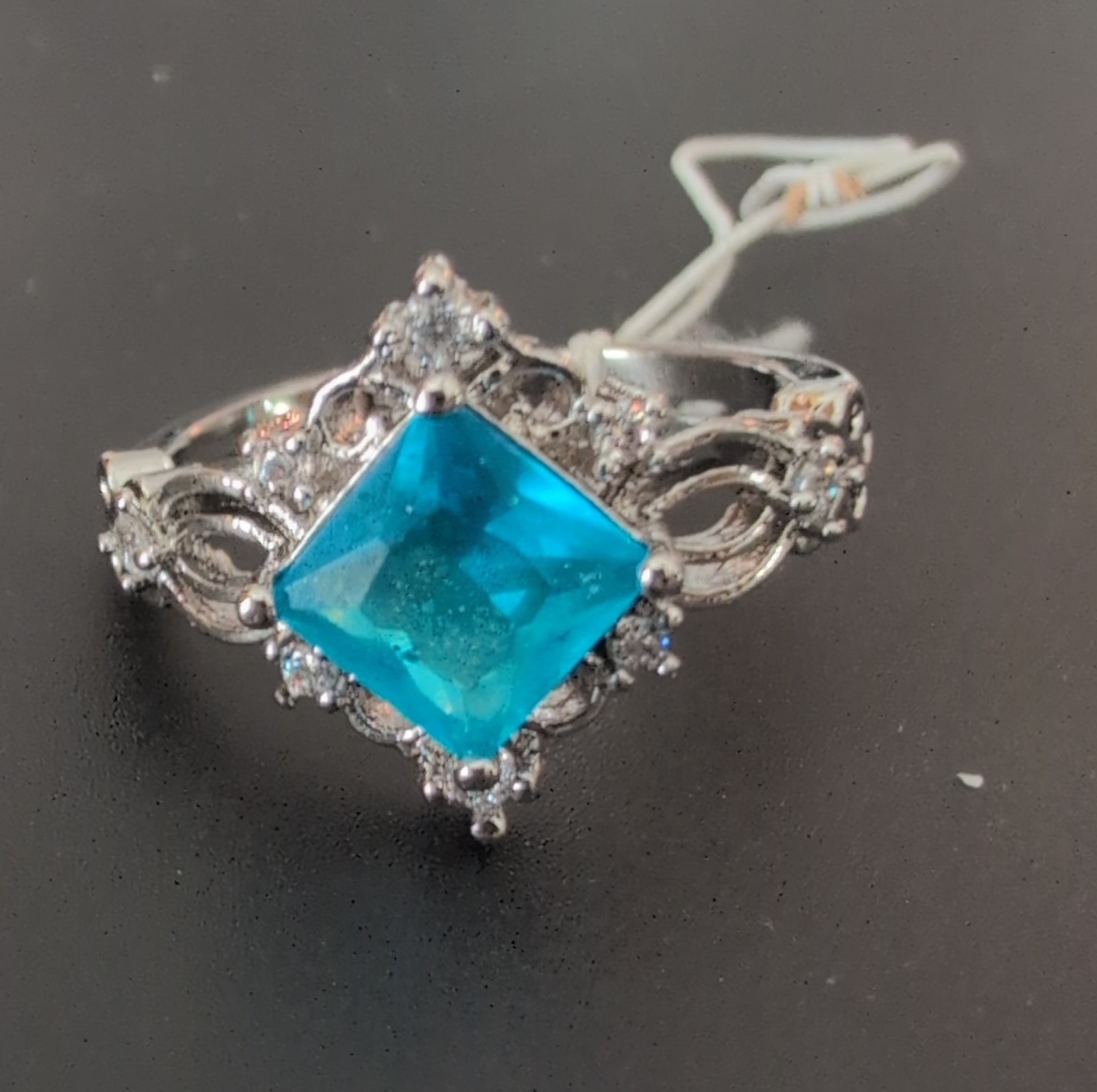 Silver Tone Cocktail Ring with Blue Square Stone Prong Setting