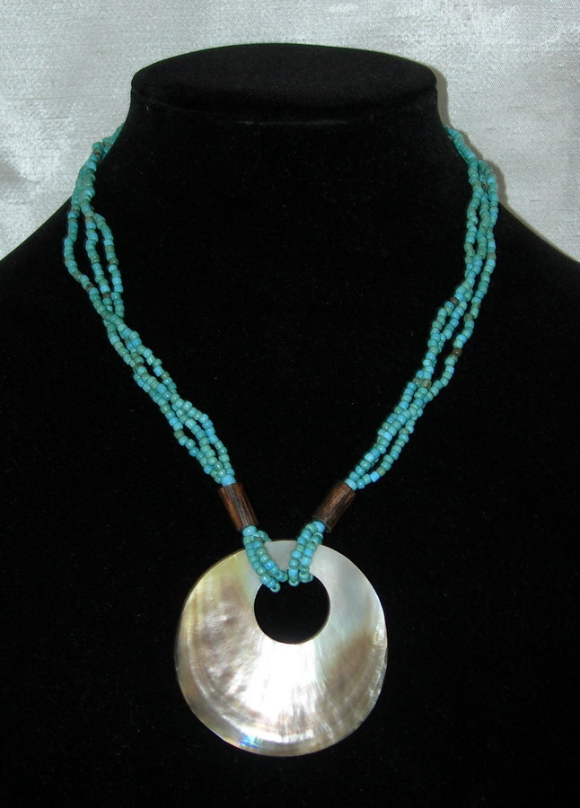 Santa Fe Style Turquoise Color Bead Three Strand Necklace with Shell Centerpiece