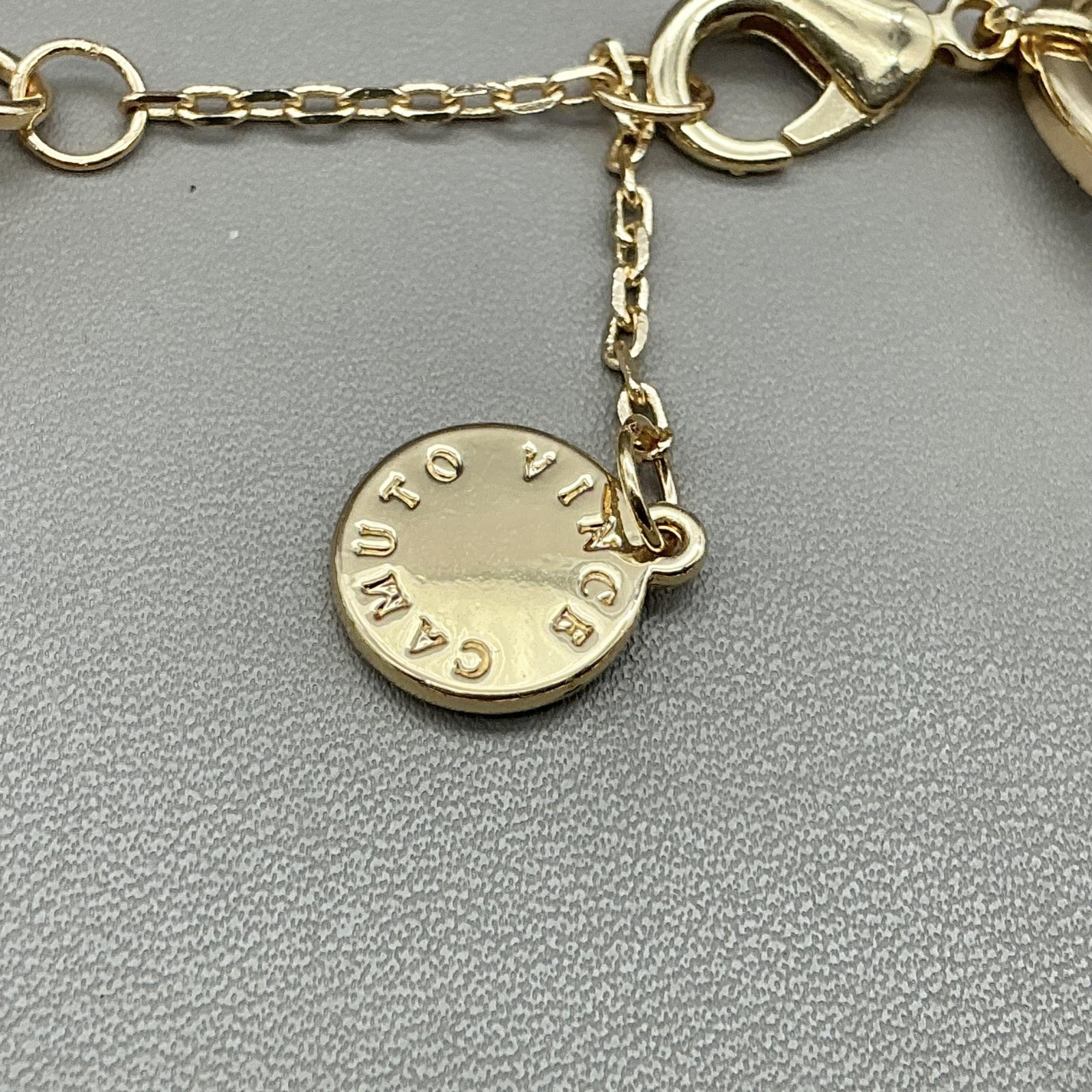 Vince Camuto Bracelet Gold Tone Chain Link Womens Logo Charm Lobster Clasp 8″