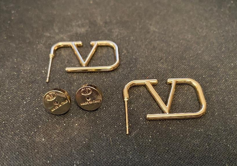 Stunning Pre loved Womens Valentino Gold Tone V Logo Earrings.