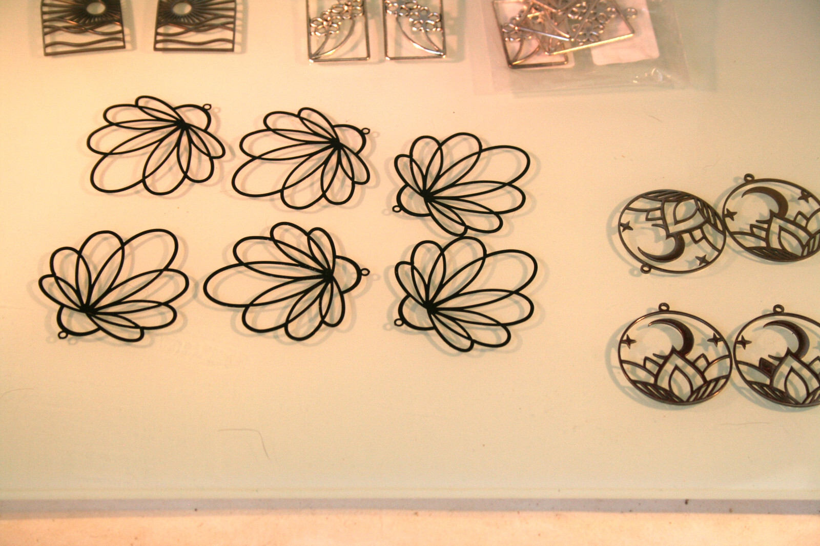 Stainless steel hollow style earring bases, various designs 43 total pieces